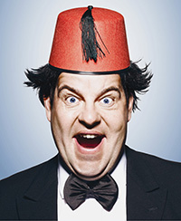 Damian-Williams-as-Tommy-Cooper-Photo-Credit-Yvan-Fabing-560x683