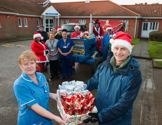 Staff-from-the-hospital-receive-the-gifts-from-the-Norfolk-Vintage-and-Classic-Tractor-Club