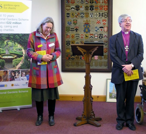 Fiona Black (County Organiser NGS),  Bishop of Norwich Rt Rev Graham Jenkins launching booklet at Bishop’s House