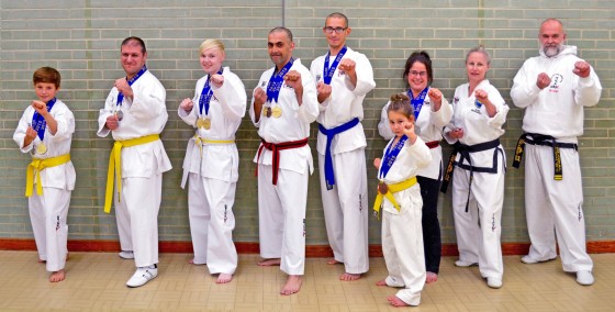 medal-winners-and-instructors-fighting-stance-oct-2015