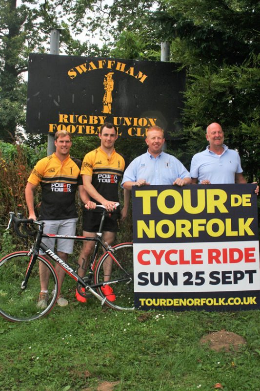 Swaffham rugby club feed station with, from left: Stuart Hamilton and Matthew Clarke, both 1st XV players who will be cycling; Adam Lamb Swaffham RUFC Chairman and Russell Evans, Bullards Beers.