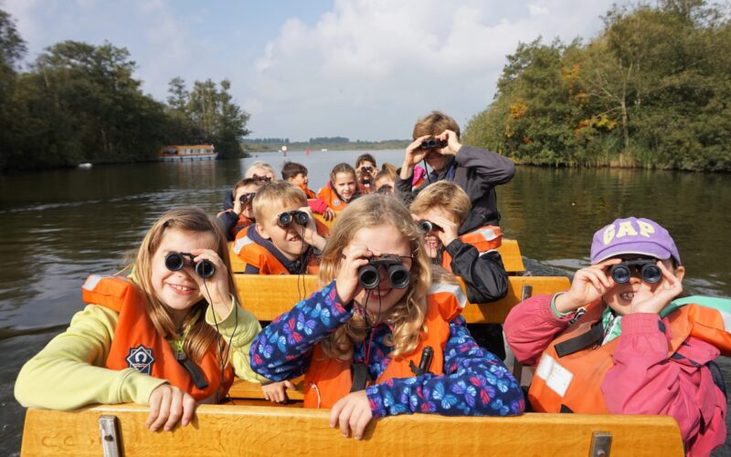 The day job – a school party enjoying exploring on one of How Hill’s boats – picture How Hill Trust 